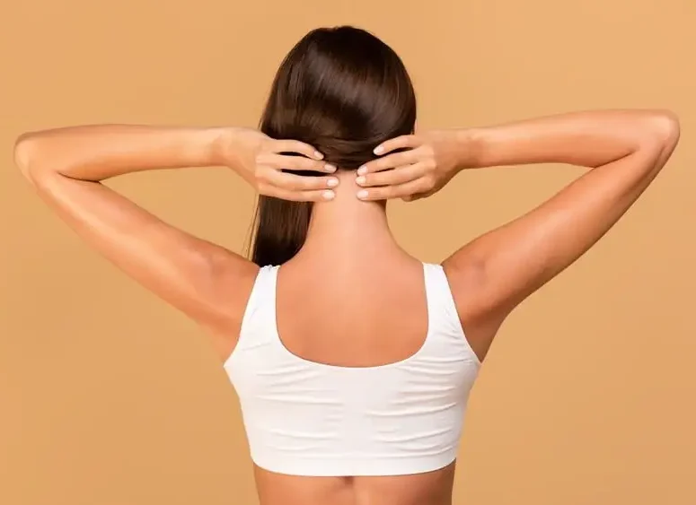massaging-her-neck